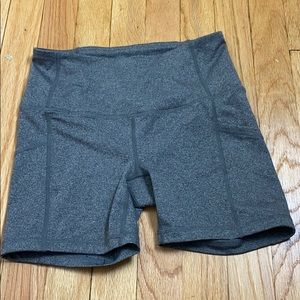 Never worn Reebok athletic shorts with pockets